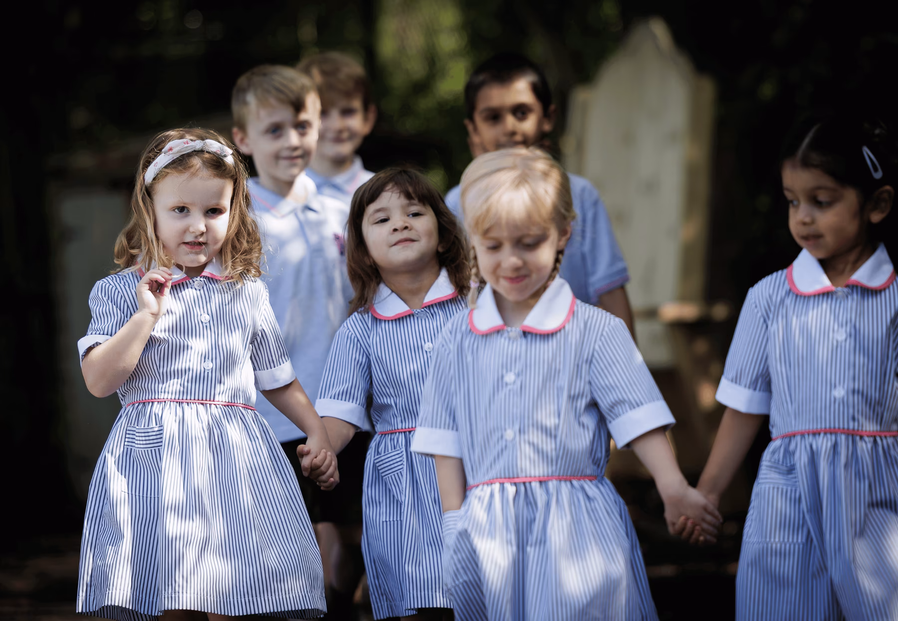 boys and girls walking into prep school in potters bar, hertfordshire