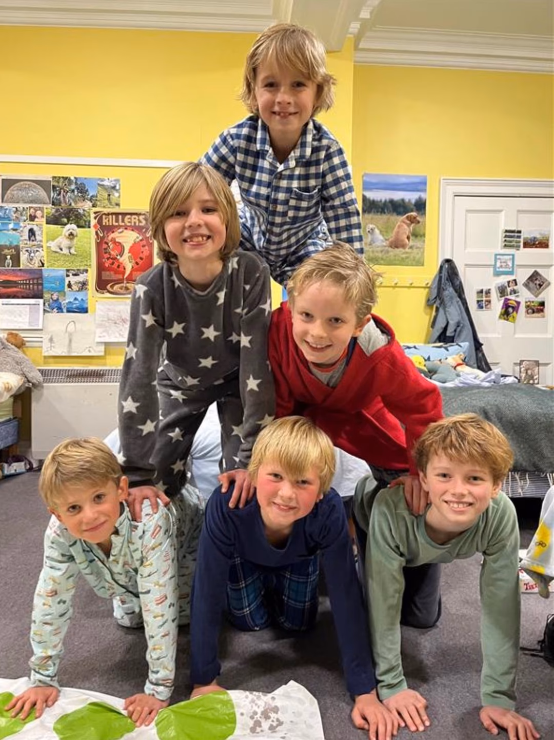 A pyramid of junior boys in the boys' boarding house.