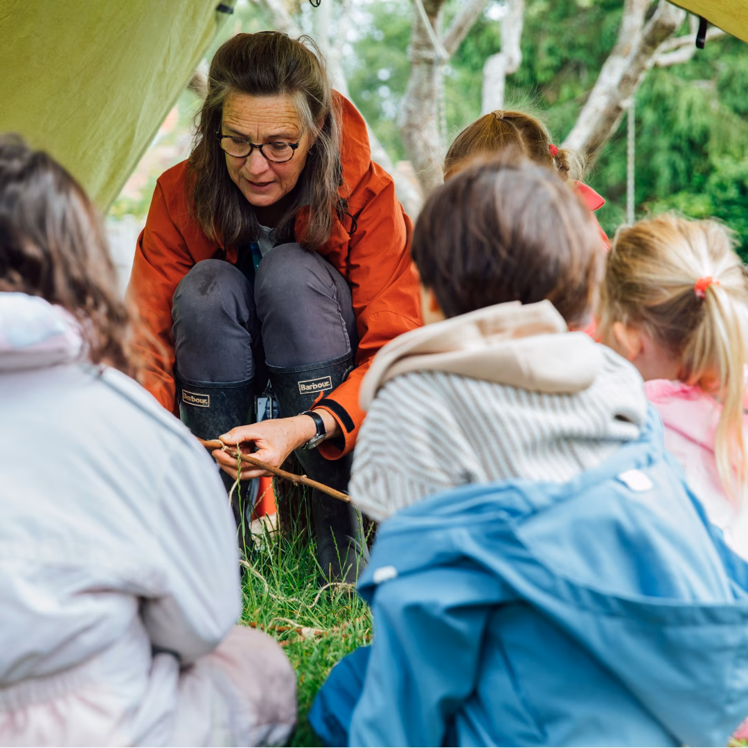 Forest School being led by Lydia